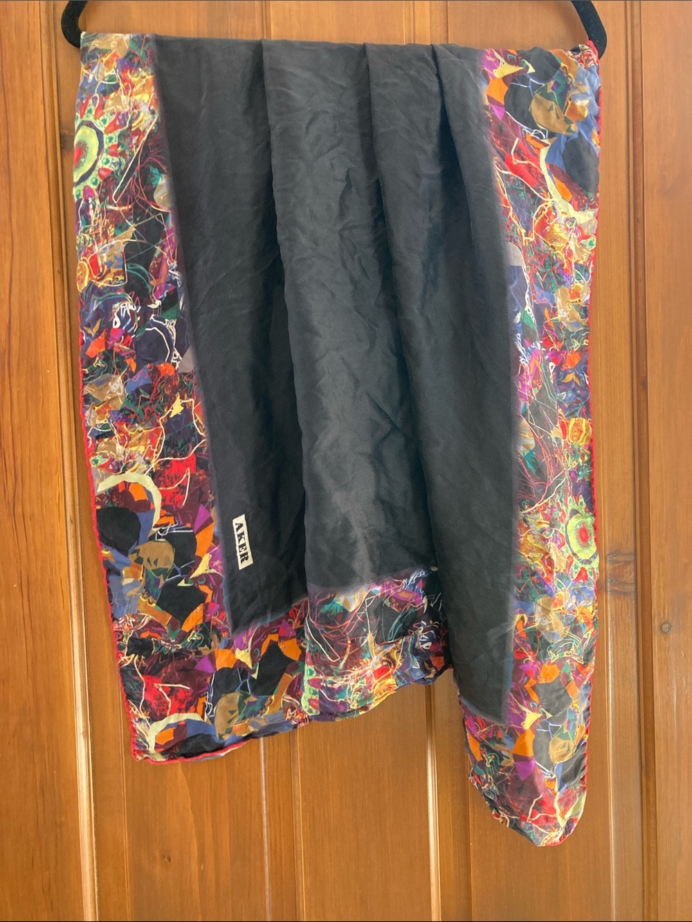Aker Black Silk Scarf with Multicolor Abstract Border. Excellent condition.